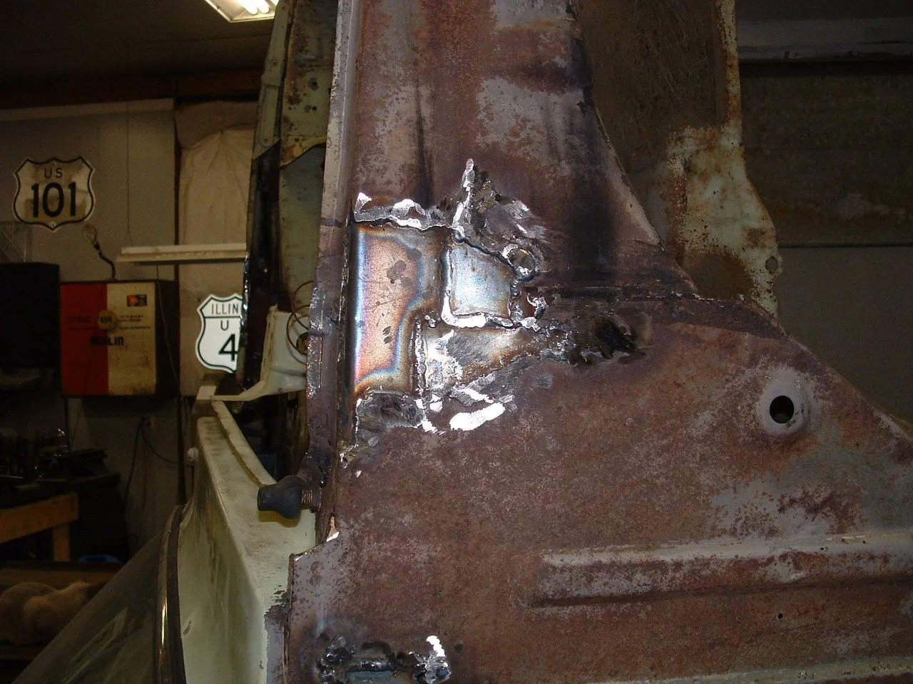 Mazda 1200 after rust repair.JPG
