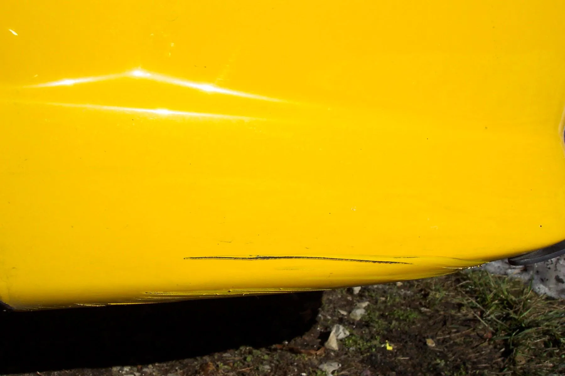 mazda bumper gash 1.jpg