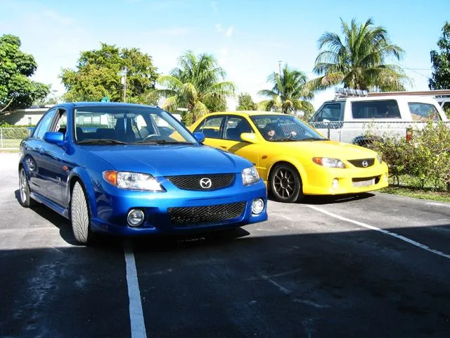 mazda mp3 '02 yellow and blue.jpg