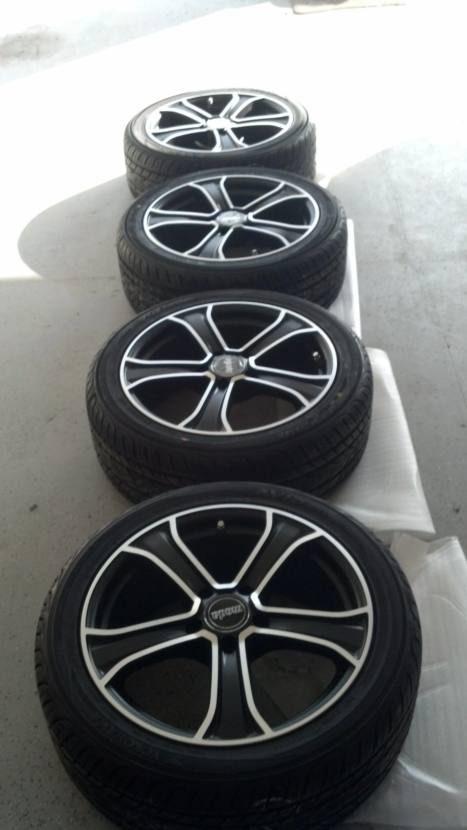 Rims And Tires Laid Out 01.jpg