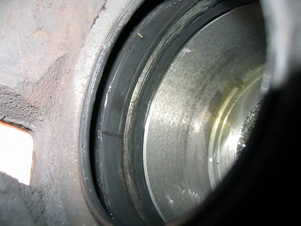12 Inside Front Caliper Note Cracked Piston Seal.webp