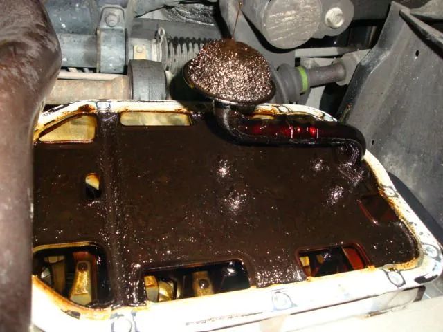 B4 pulling oil pan off.jpg