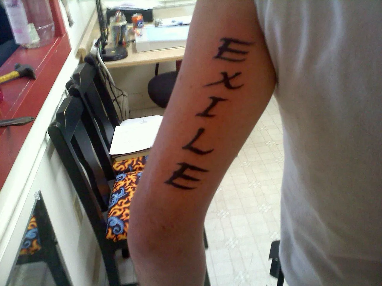Exile Tat.webp