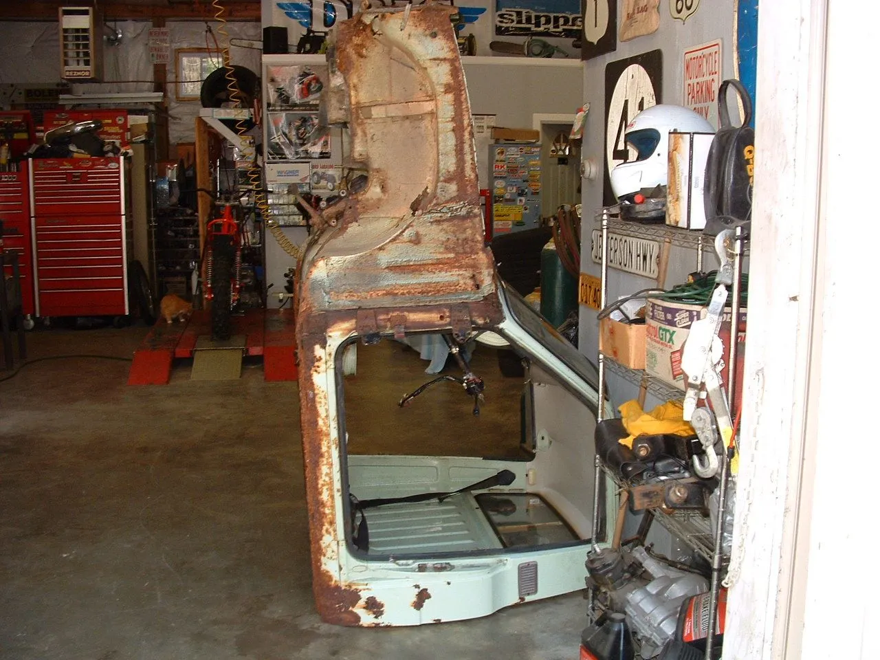 Mazda 1200 cab in shop.JPG