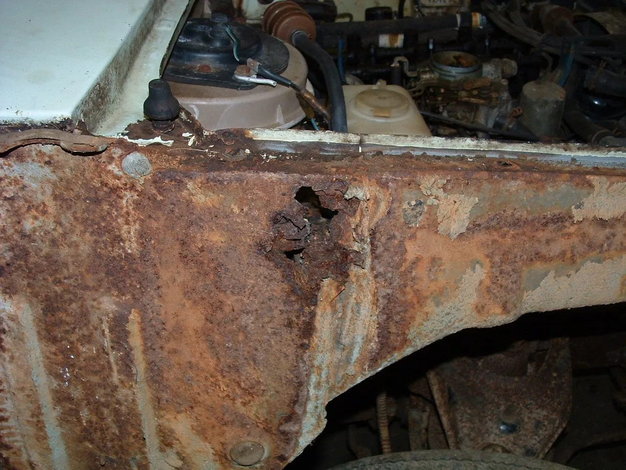 Mazda 1200 rust in front structure.JPG