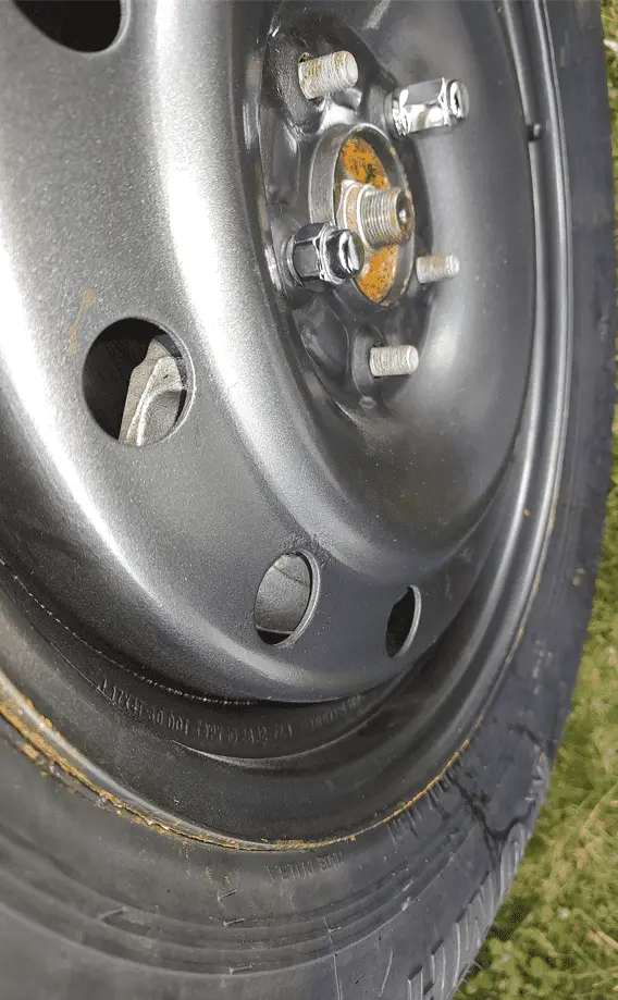 mazda caliper clearance with kia sorento spare .png