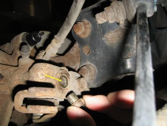 Mazda P5 - retracting integral rear park brake caliper piston 2.jpg
