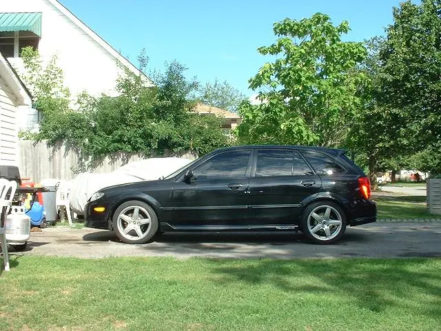 Protege 5 tinted windows 001a.JPG