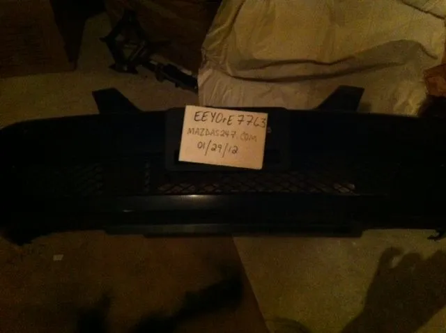 Protege bumper with sign.webp