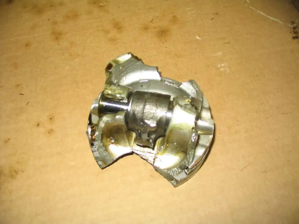 trashed_piston1_low.jpg