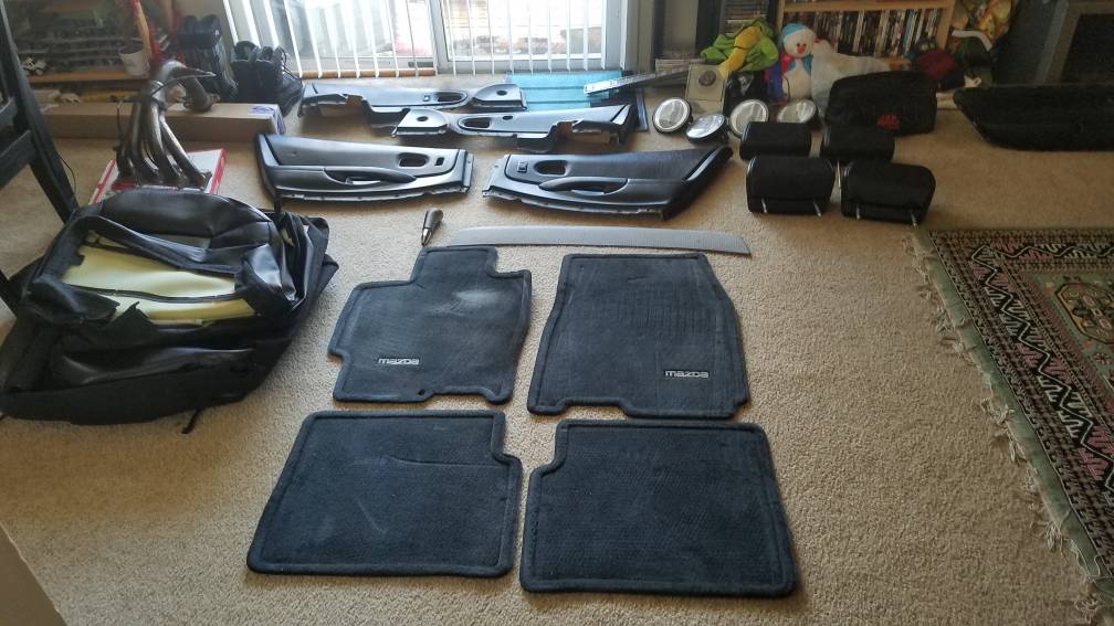 Various parts from junked P5, leather, header, +more!