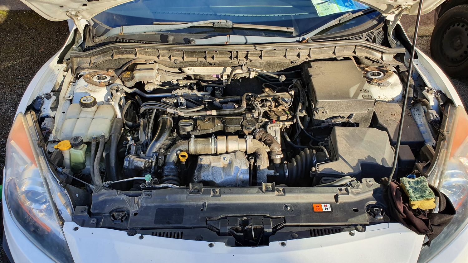 2011 Mazda3 Sport (1.6 diesel) engine is oily. Cause? | Mazdas247