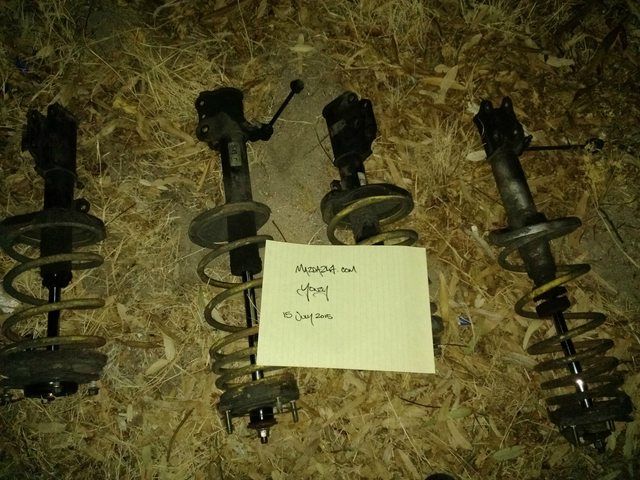 Stock Struts with crappy lowering springs