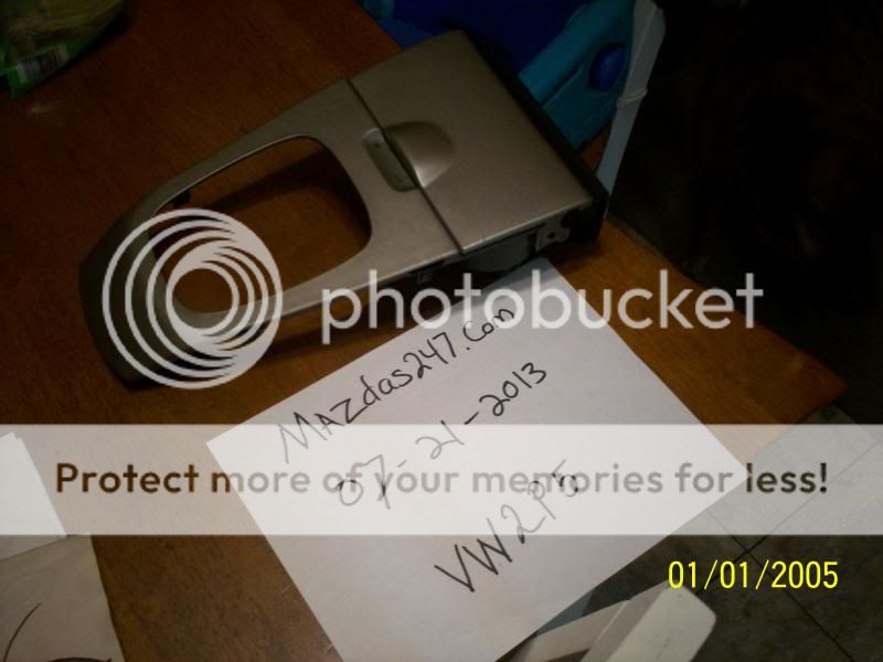 mazda protege cup holders & AC-Heater fan piece.