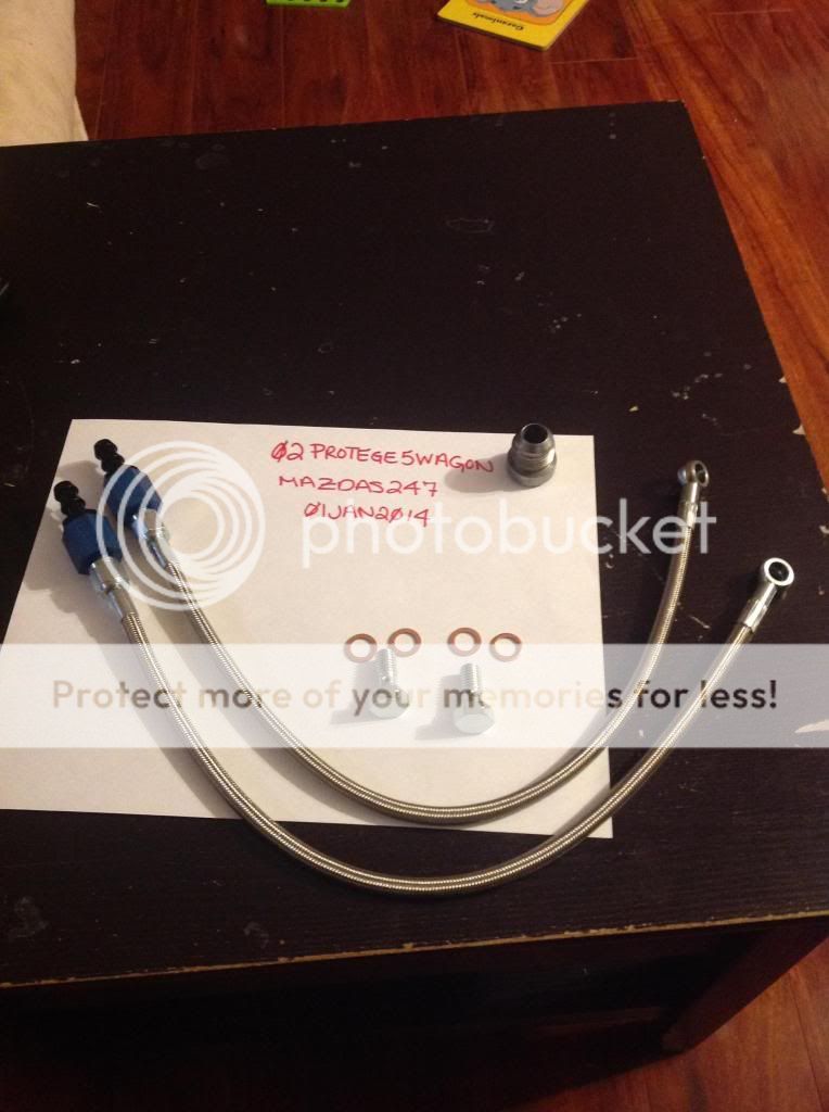 Custom turbo coolant lines, oil drain, a few stock parts